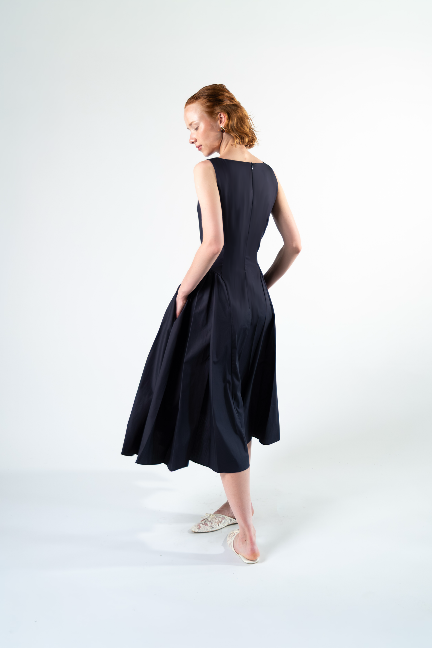 Abito midi con tasche